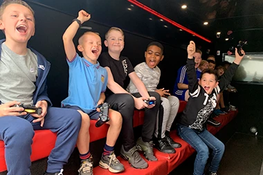 Kids having fun inside the Gamewagon